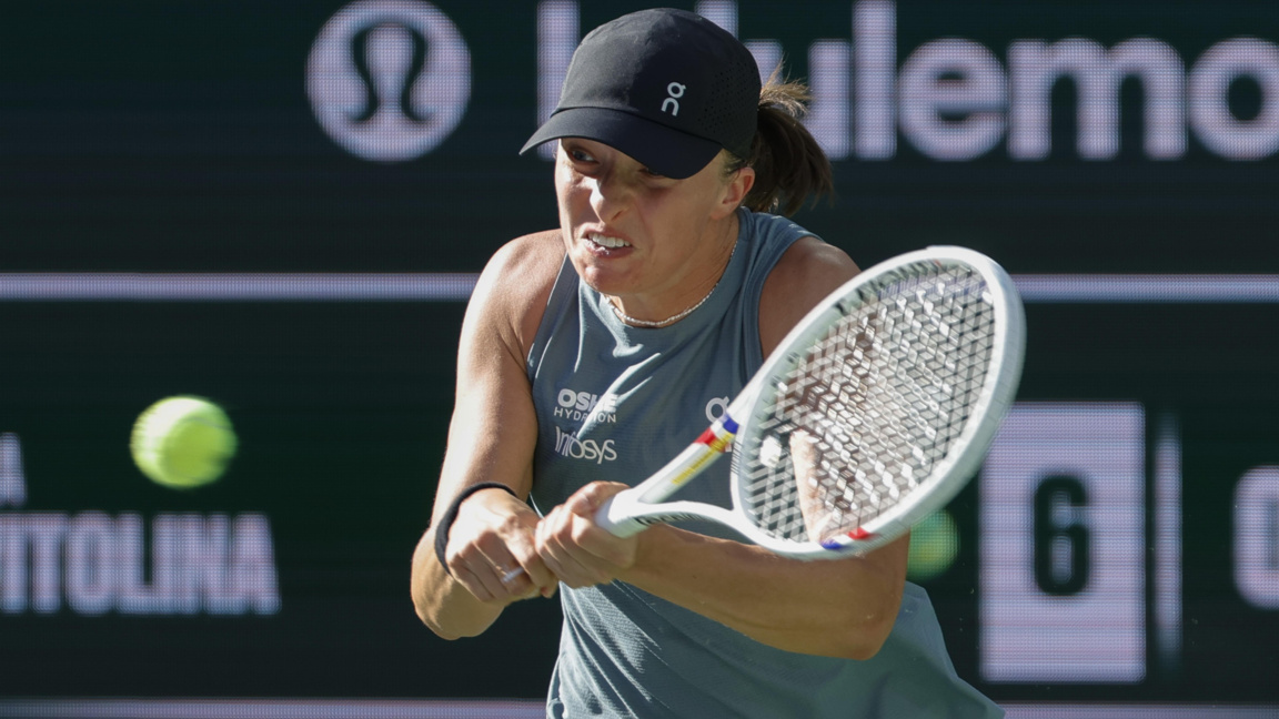 Ига Швьонтек се раздели с треньора си...